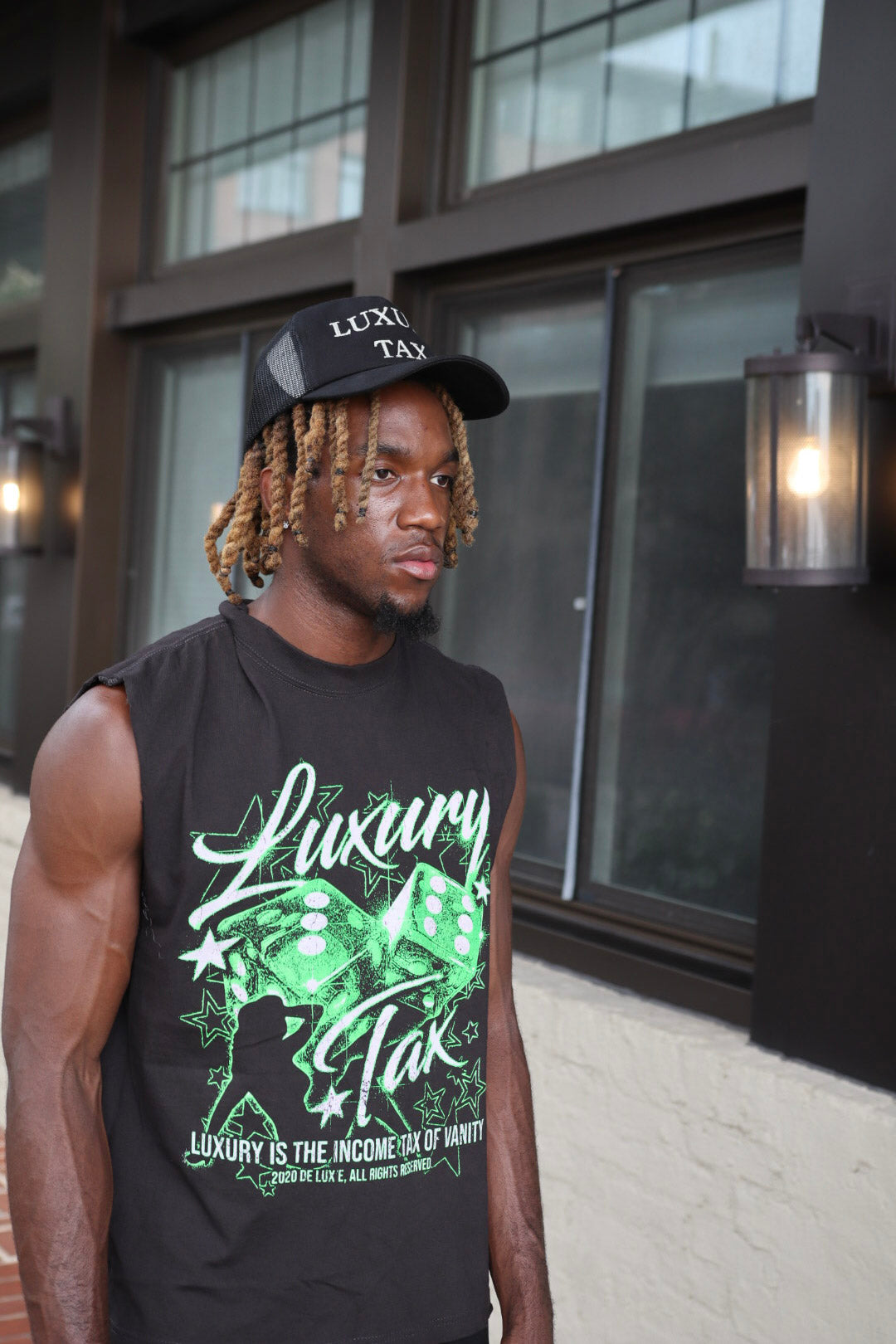 LUXURY TAX SLEEVELESS TEE
(Limited Edition)