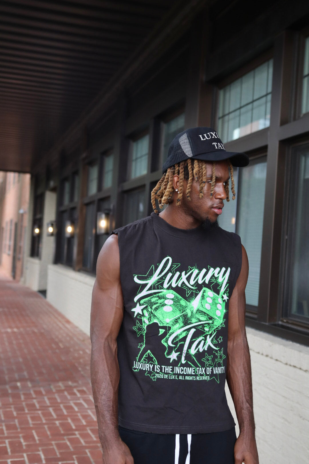 LUXURY TAX SLEEVELESS TEE
(Limited Edition)